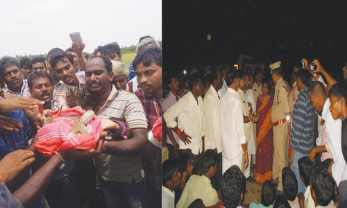 ఎస్సైని చుట్టేసిన పాము