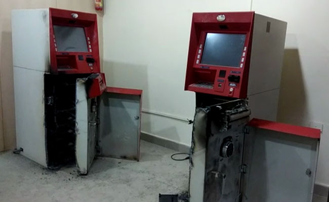 ఏటీఎంలను లూటీ చేసిన దొంగలు